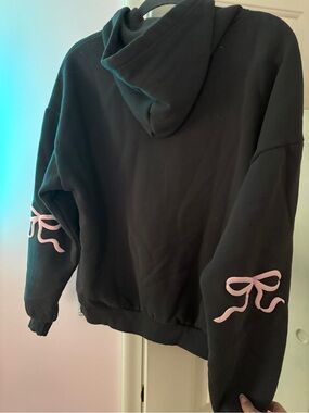 Edikted Black Hoodie with Pink Bow Sleeve Accents